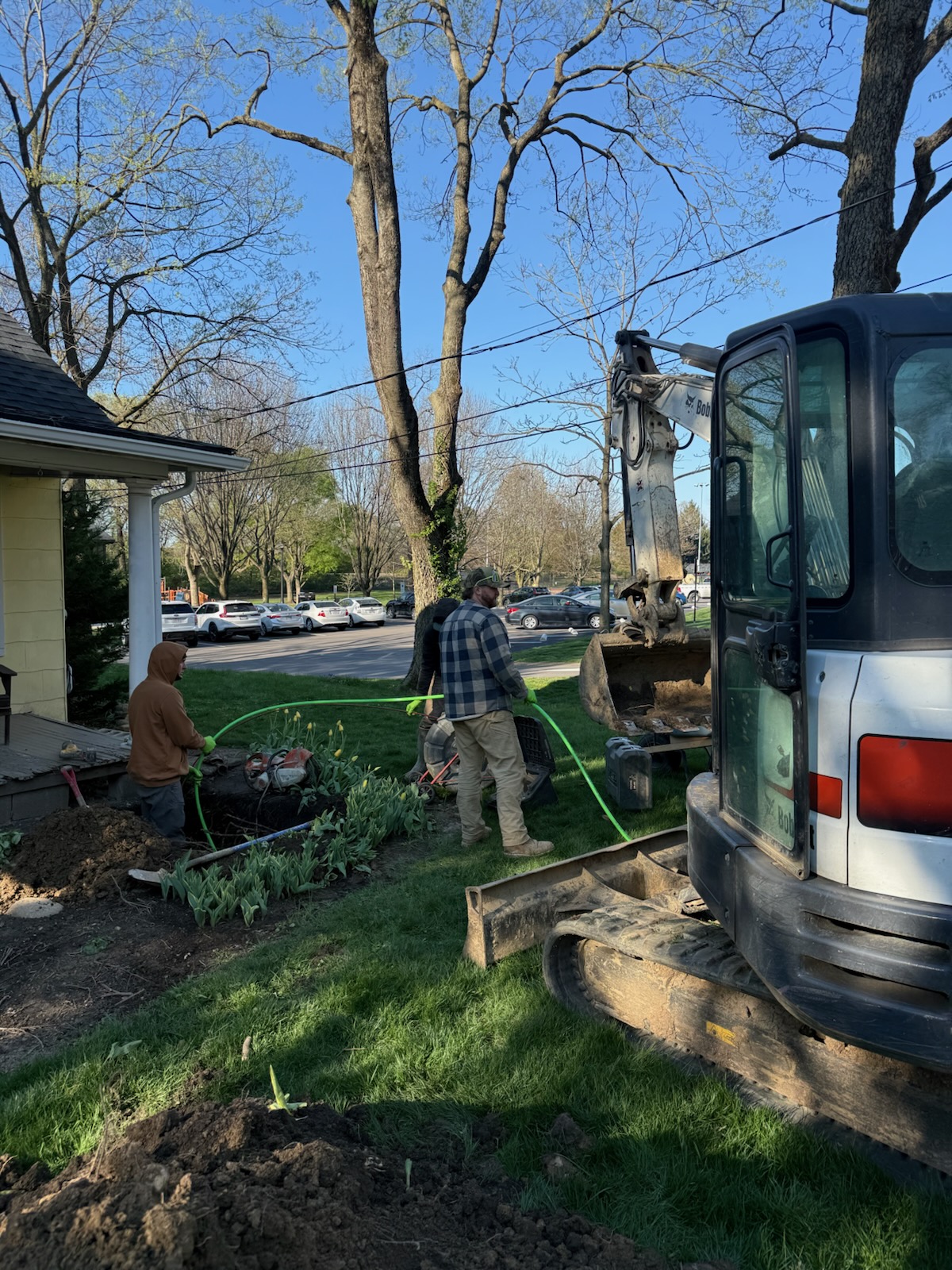 Wooley crew at a residential trenchless access pit, Columbus area